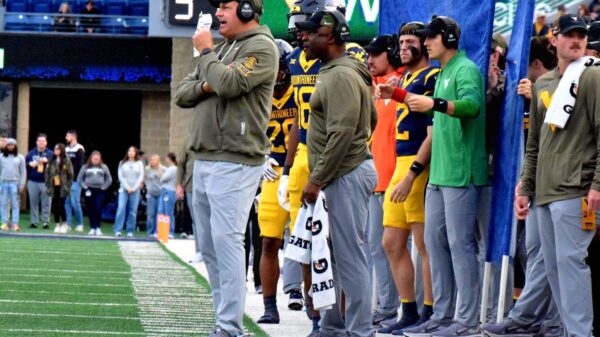 WVU Football HC Rich Rodriguesz and RB Coach Larry Porter