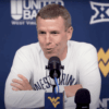 WVU Basketball HC Ross Hodge press conference white shirt