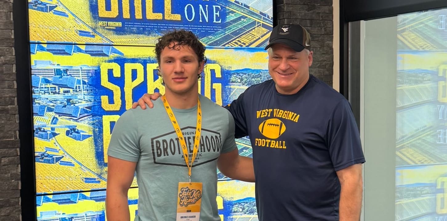 Broncs Baker with WVU Football HC Rich Rodriguez